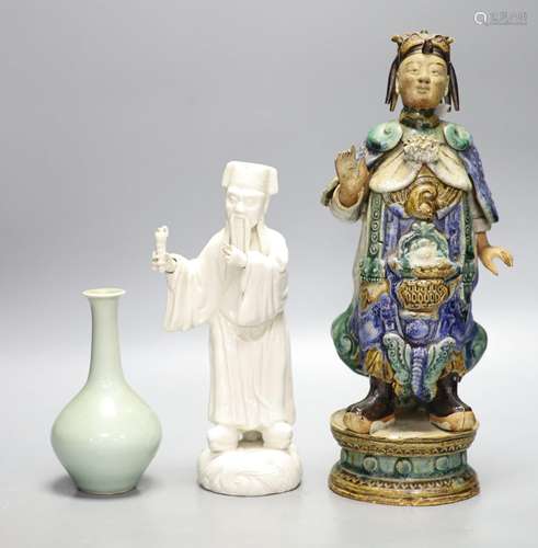 A Chinese blanc de chine figure, and Shiwan pottery figure a...