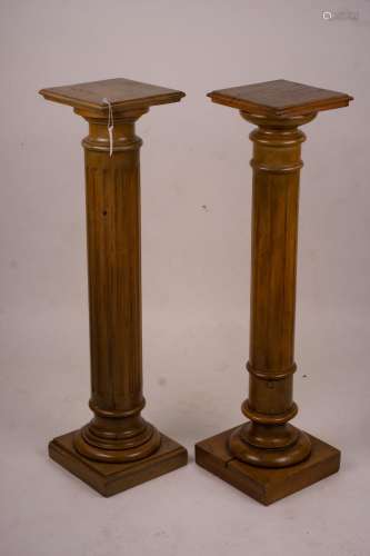 A pair of Victorian style carved beech and walnut pedestals,...