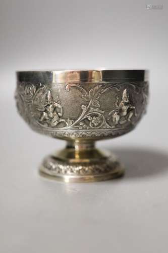 An Indian embossed white metal pedestal bowl, diameter 10.7c...