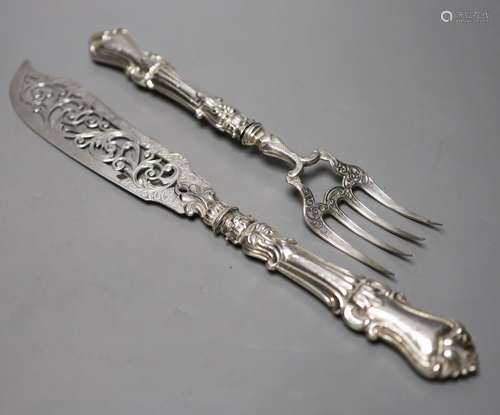 A pair of Victorian pierced silver fish servers, with loaded...