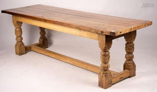 An 18th century style rectangular oak refectory dining table...