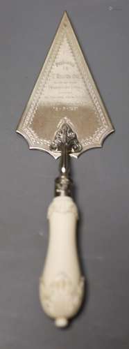 A George V ivory handled silver presentation trowel, with en...