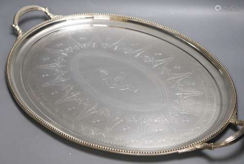 An Elkington oval plated engraved two handled tray67cm