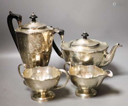 A George V four piece silver circular tea set, Fenton, Russe...