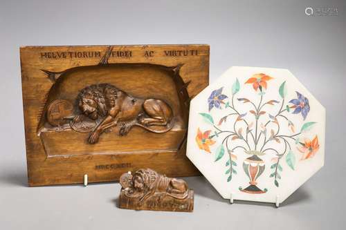 A walnut Lion of Lucerne plaque and carving and an Indian ha...