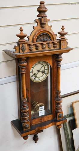 A small late 19th century Vienna wall clock, fitted with an ...