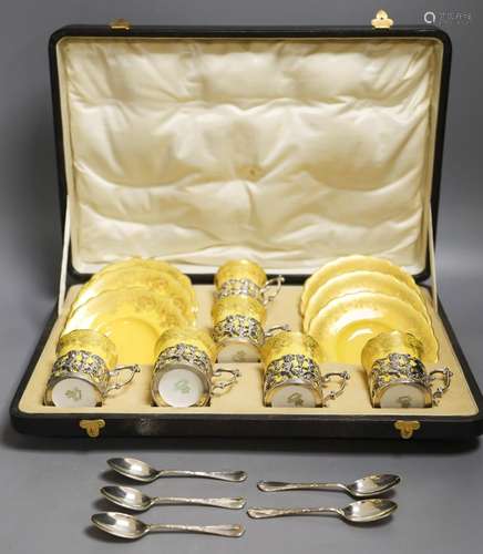 A set of six Aynsley coffee cans and saucers, with silver ho...