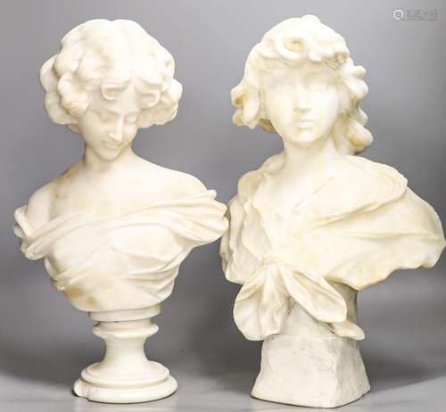 Two white alabaster busts of young women, raised on turned p...