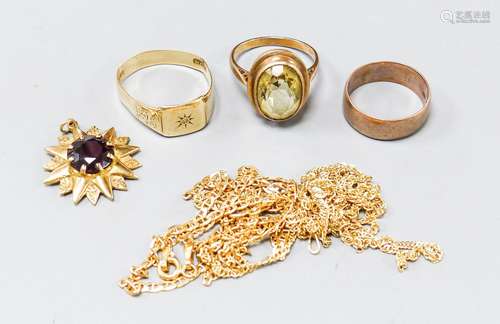 Three 9ct gold rings, two 9ct gold chains and a 9ct gem set ...