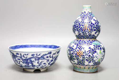 A 19th-century Chinese blue and white dragon bowl and a Chin...