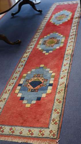 Two Caucasian design runners, larger 350 x 74cm