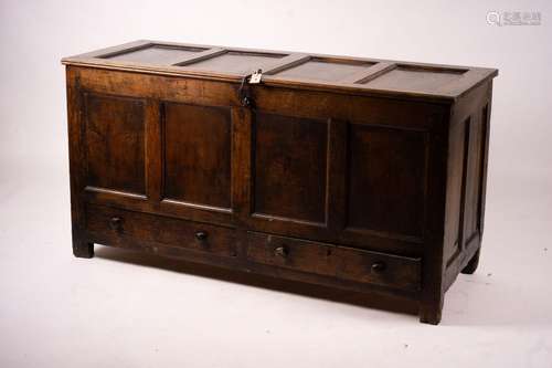 An 18th century panelled oak mule chest, length 161cm, depth...