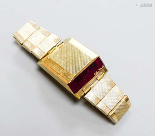 A gentleman's steel and gilt base metal Bulova digital wrist...