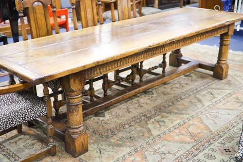 An 18th century style pale oak refectory dining table, lengt...