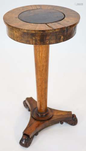 A Regency banded rosewood circular topped work table, raised...