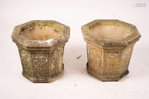 A pair of octagonal reconstituted stone garden planters, wid...