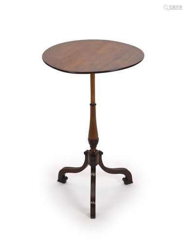 A George III mahogany wine table,with plain circular top, on...