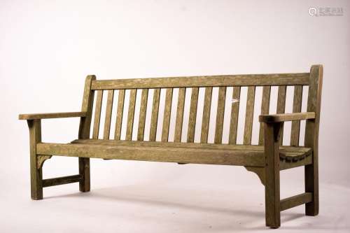 A weathered teak garden bench, length 192cm, width 60cm, hei...