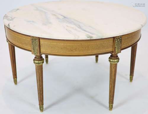 A Louis XVI inlaid mahogany circular marble topped table, di...