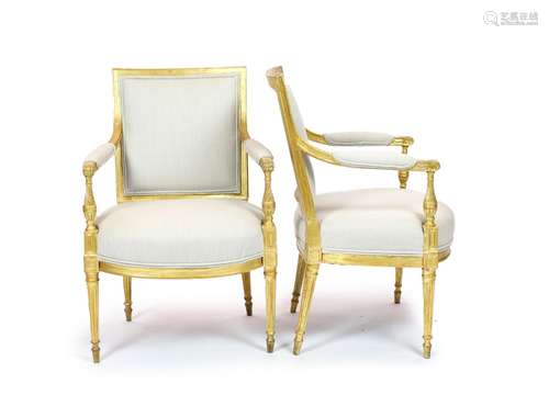 A pair of Louis XVI style giltwood elbow chairswith moulded ...