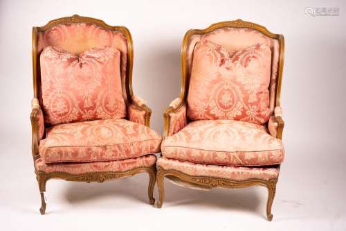 A pair of early 20th century French carved beech armchairs, ...