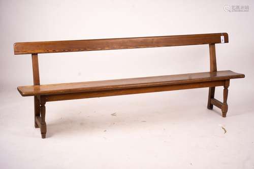 A Victorian pitch pine bench seat, W.214cm H.79cm