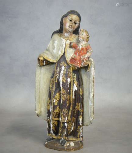 Vierge tenant l'Enfant sur son bras gauche en bois sculpté p...