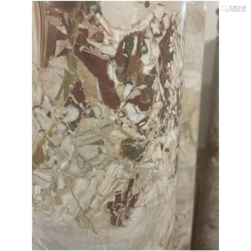 4 solid jasper columns on a white marble capital