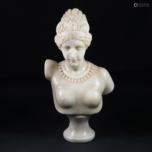 A white marble bust of a lady with necklace
