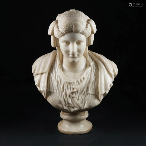A white marble bust of a lady