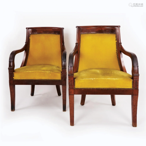 A pair of French mahogany armchairs