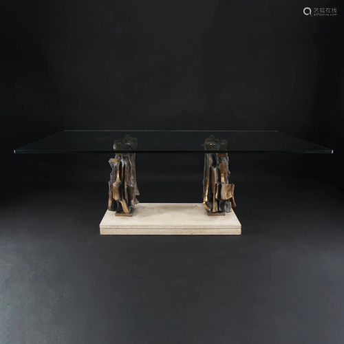 A patinated bronze and travertino glass top table