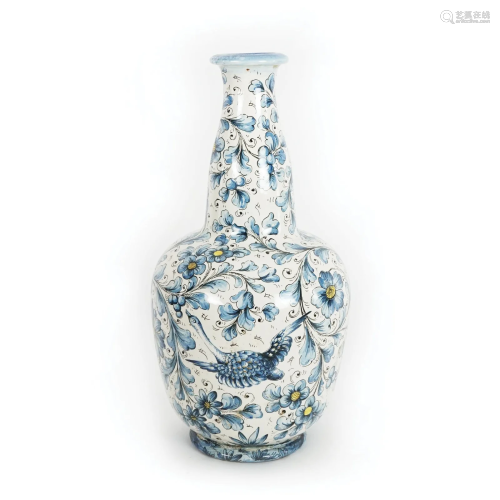 A white, blue and yellow maiolica vase