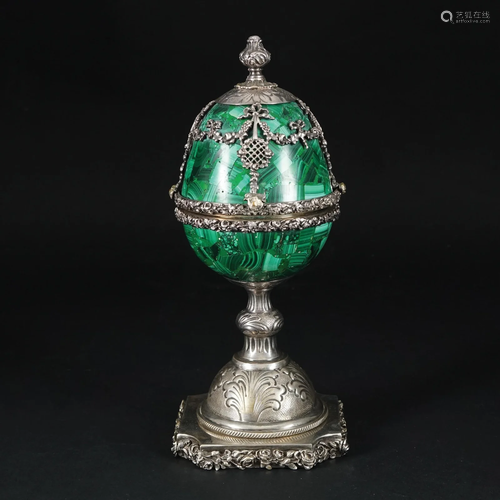 A silver and malachite egg box