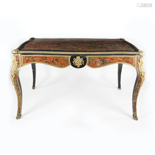 A French gilt metal inlaid ebonised wood writing desk