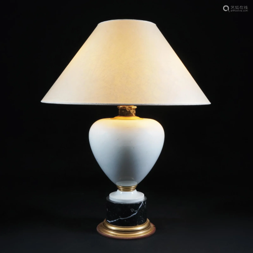 A white and black marble table lamp