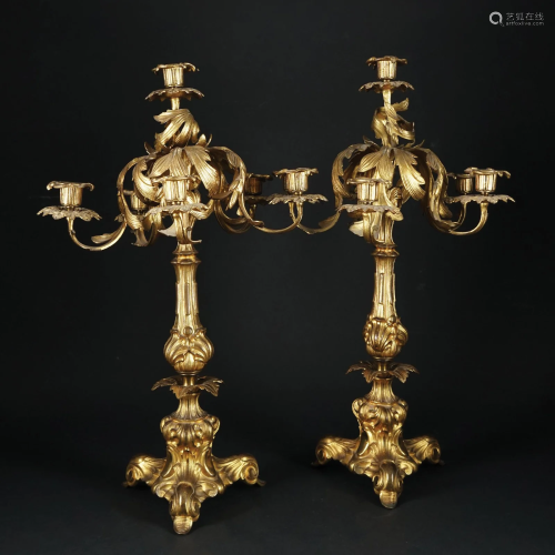 A pair of chiseled gilt bronze six-light candelabra
