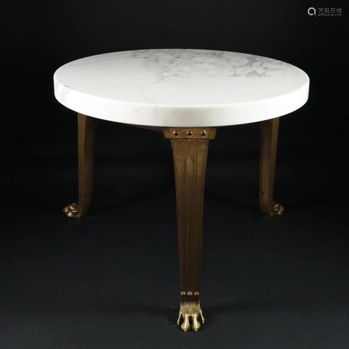 A round white marble top gueridon