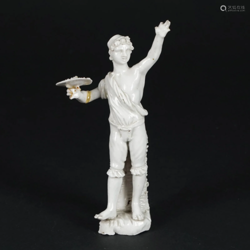 A white porcelain male figure with carrying a dish