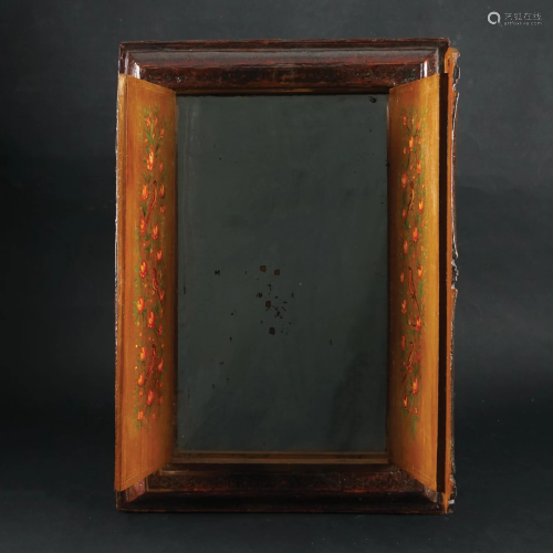 An Indian laquered polychrome wood wall mirror