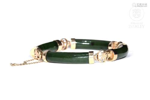 Pulsera de jade y oro de 14k.