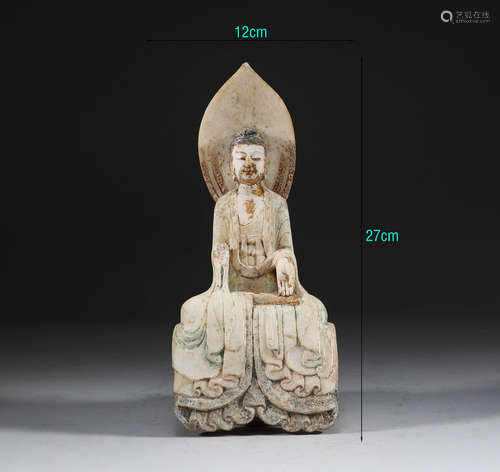 In the Tang Dynasty, white marble painted Buddha sitting