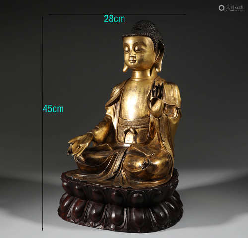 In the Ming Dynasty, a bronze gilded statue of Sakyamuni Bud...