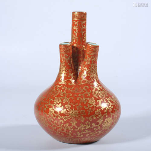 Qing Dynasty Qianlong gold colored five tube bottle with red...