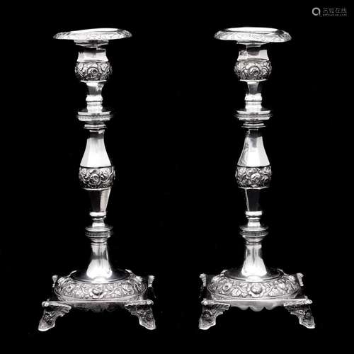 A PAIR OF ROMANTIC CANDLESTICKS