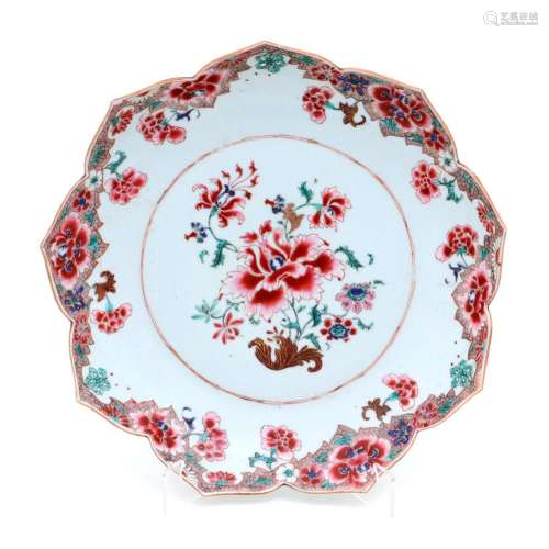 A LARGE SCALLOPED PLATE
