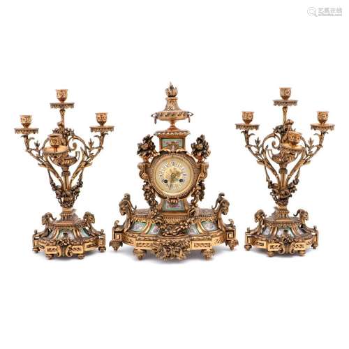 A CLOCK AND A PAIR OF CANDELABRA
