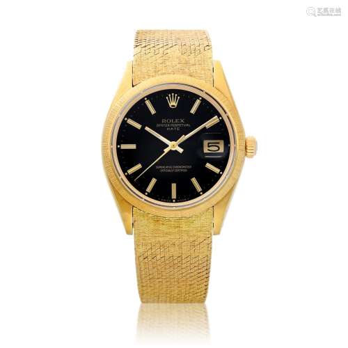 Oyster Date, Reference 1511, A yellow gold wristwatch with d...