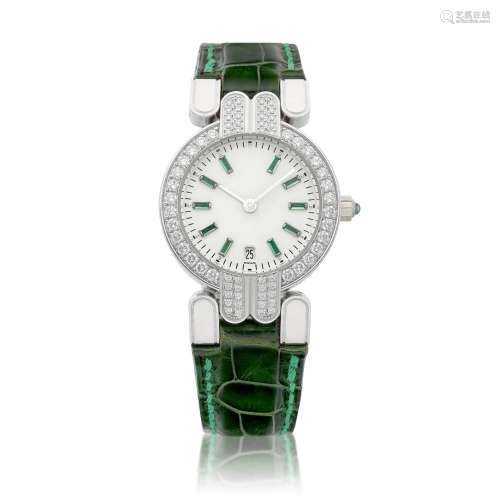 A white gold emerald and diamond-set wristwatch with date, C...