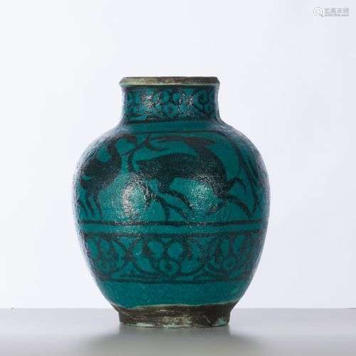CAZAUX Edouard Un vase en céramique à décor de ronde d'anima...